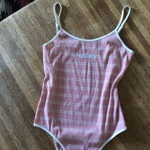 “Honey” pink striped onesie